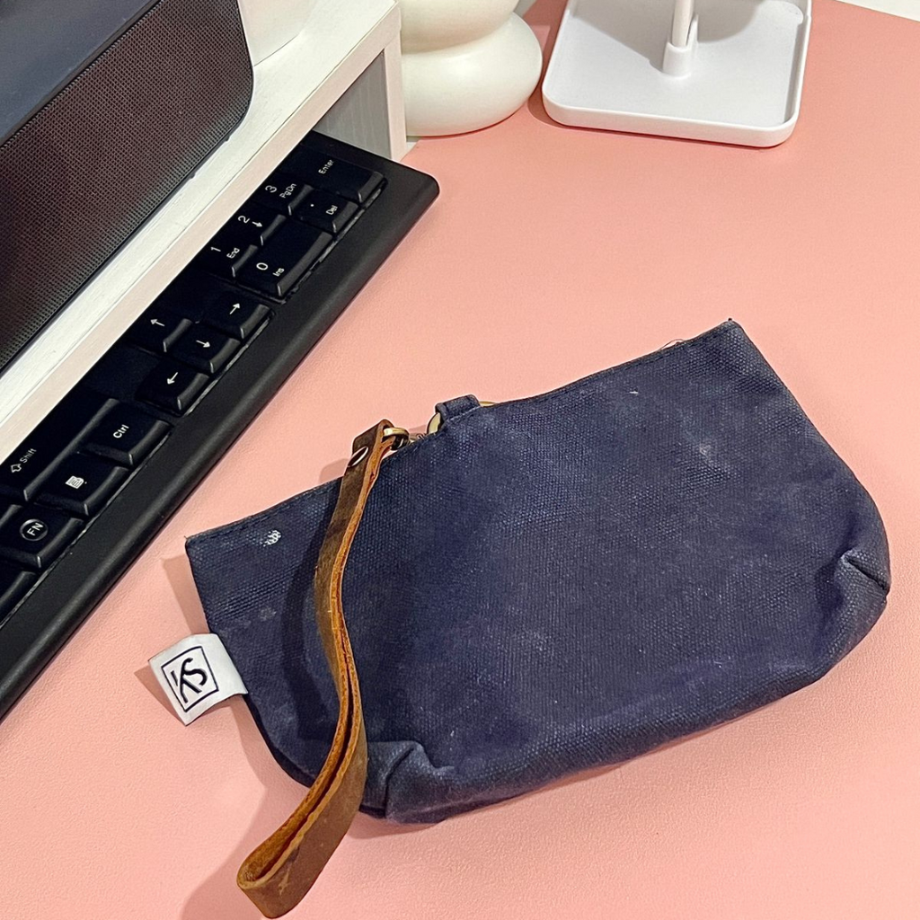 Discover the Waxed Canvas Clip-On Clutch Waterproof, Stylish & Built to Last